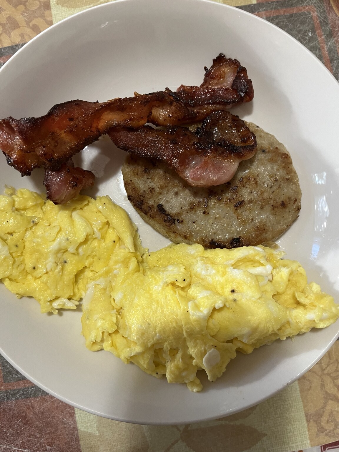 A protein-focused breakfast with eggs, bacon, and sausage
