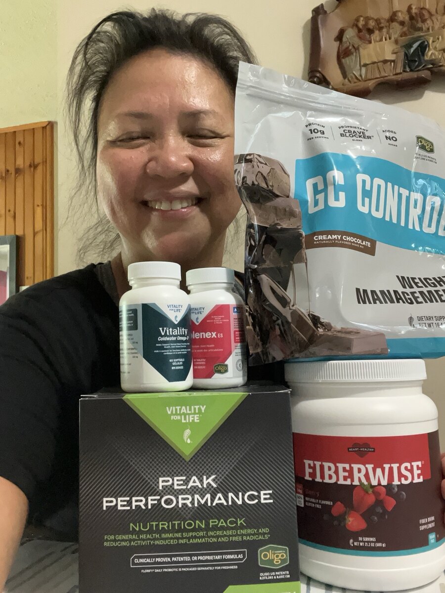 Gina Marie with the supplements she personally uses